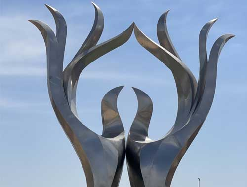 Large stainless steel Hands of Hope Sculpture in Iraq